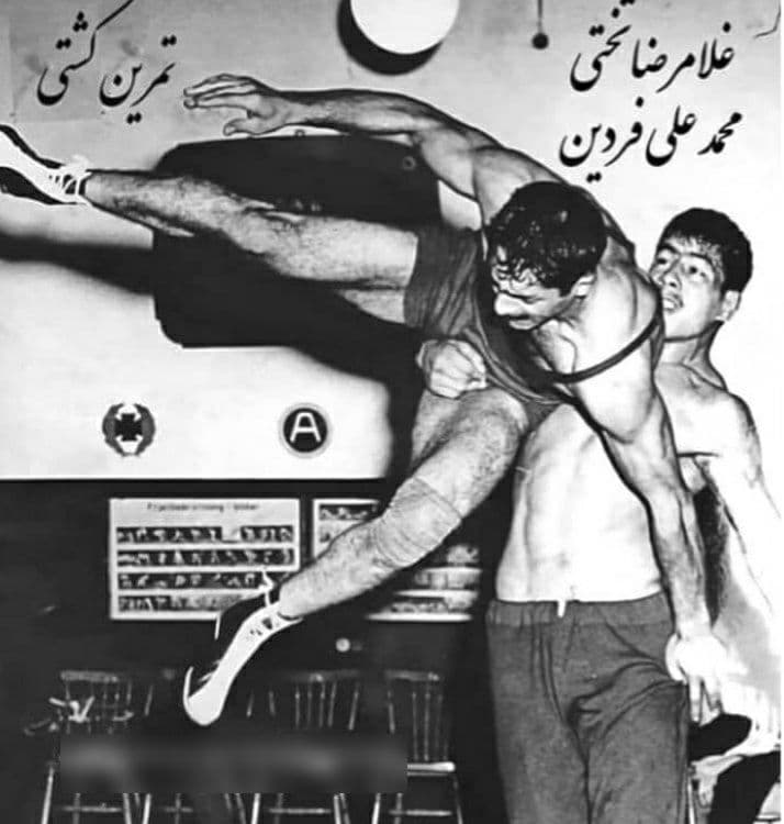 عکسی نایاب از تمرین کشتی غلامرضا تختی و محمد علی فردین